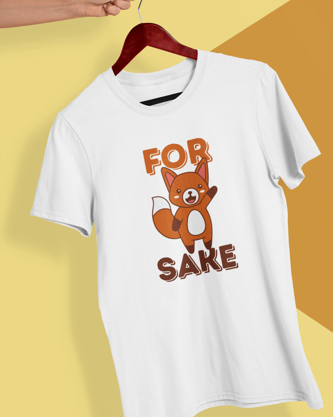 funny graphic t-shirt on a hanger which reads "for fox sake"